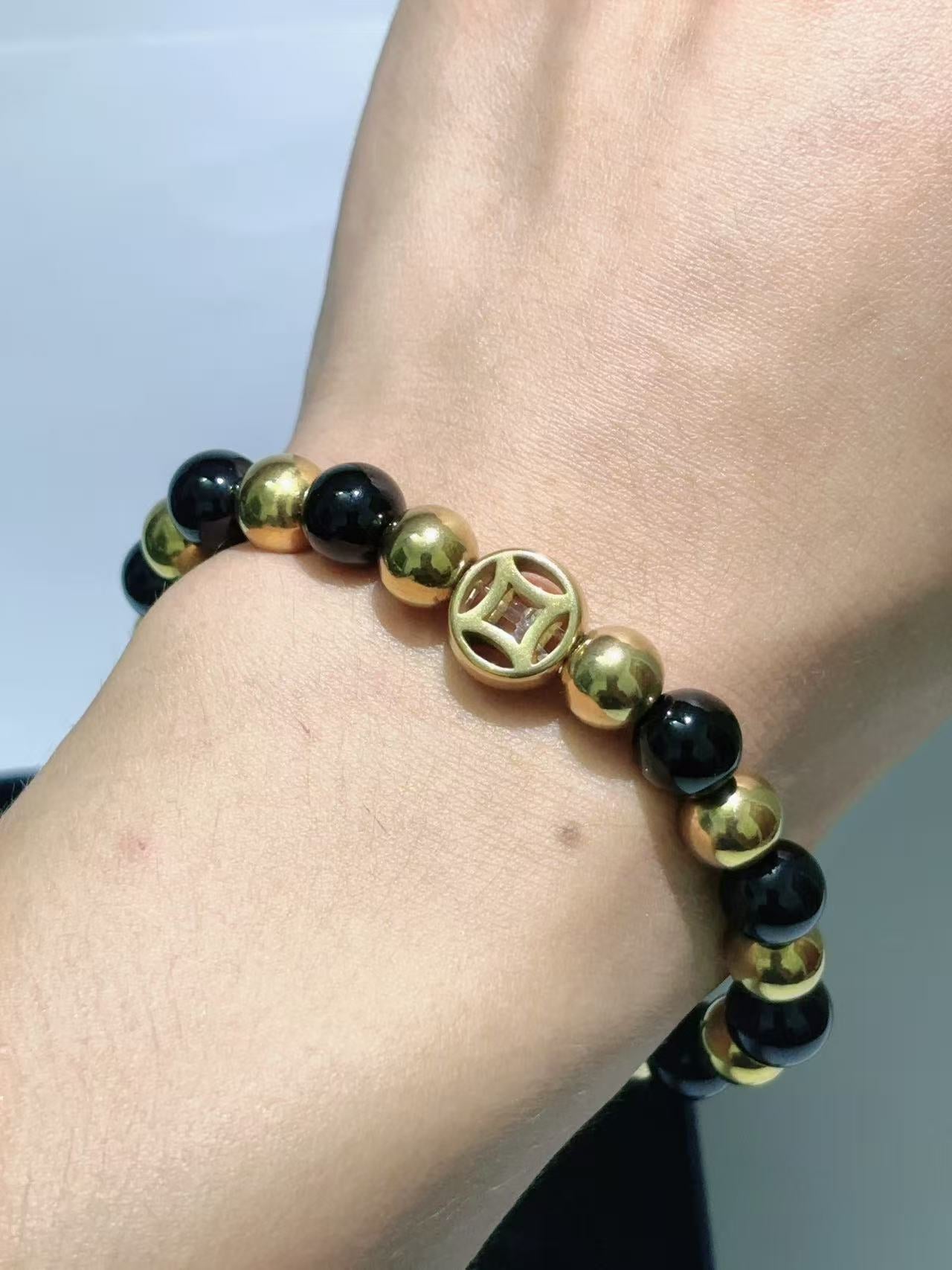 铜钱款黑珠招财手链