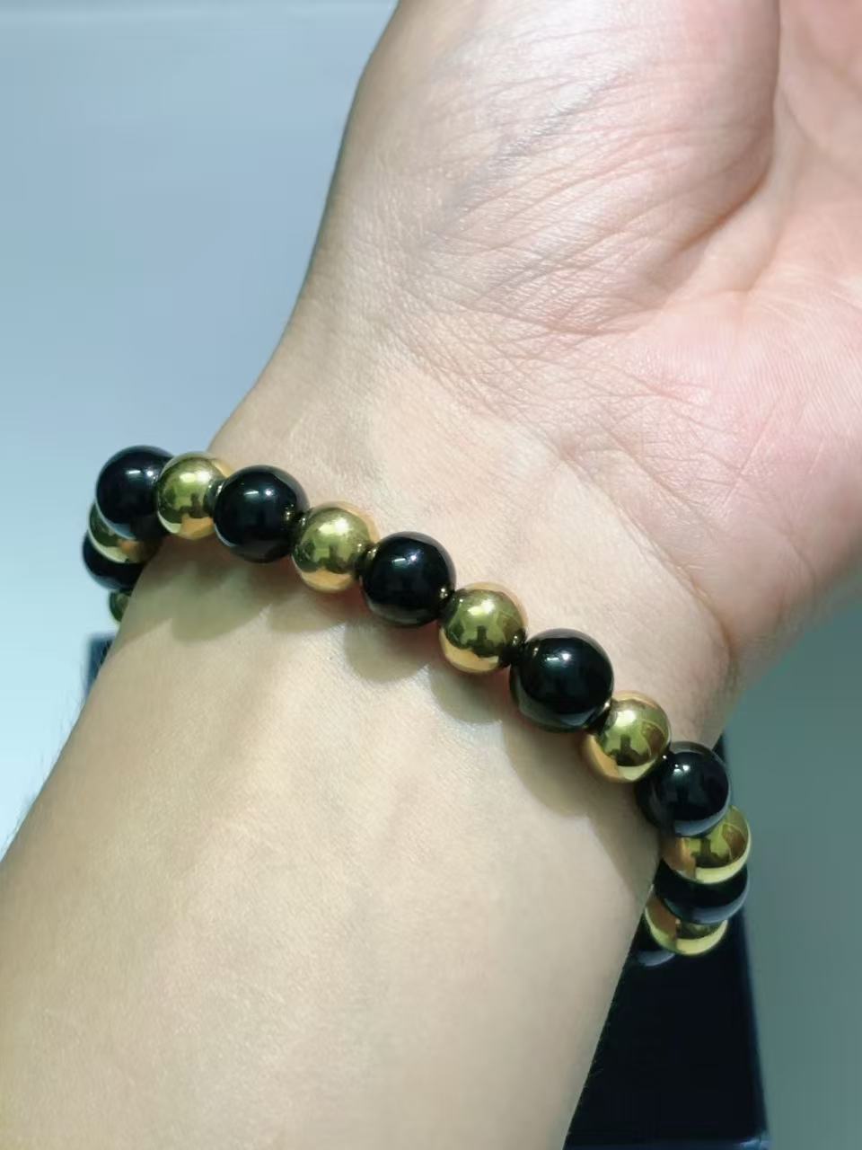 铜钱款黑珠招财手链